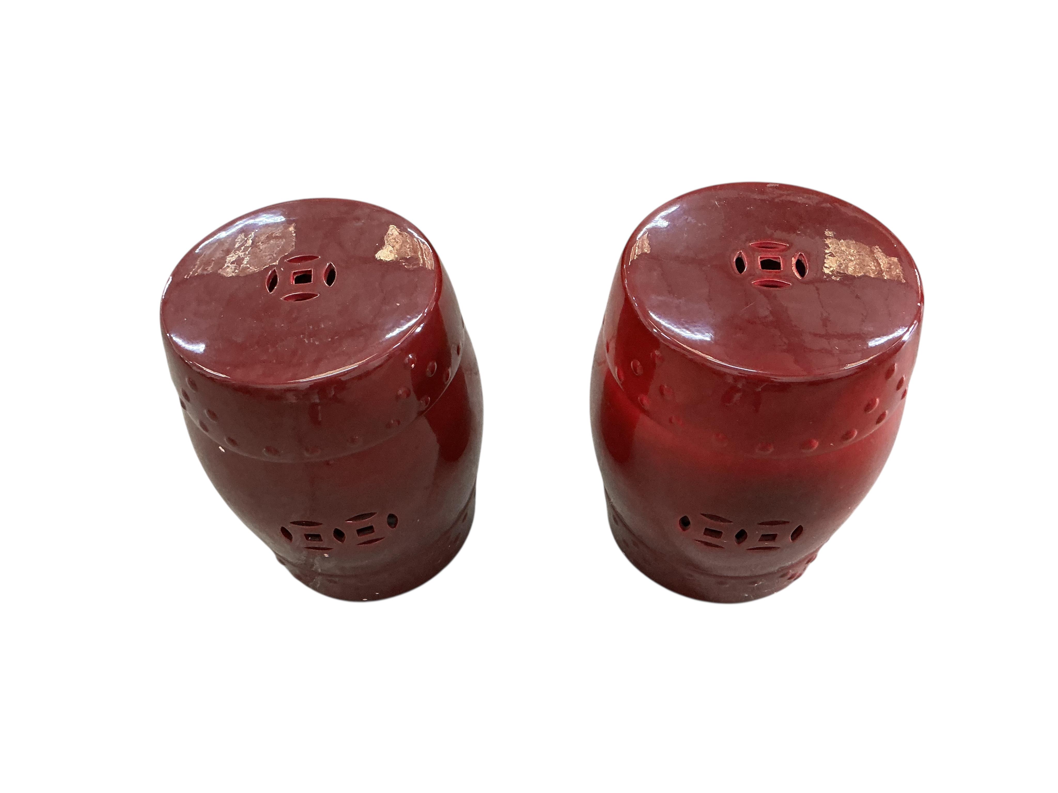 A pair of Chinese flambé glazed earthenware garden seats, diameter 32cm, height 47cm, Provenance: The late Kenneth Turner (1936-2025), celebrity florist, designer and perfume retailer, he received the Royal Warrant from